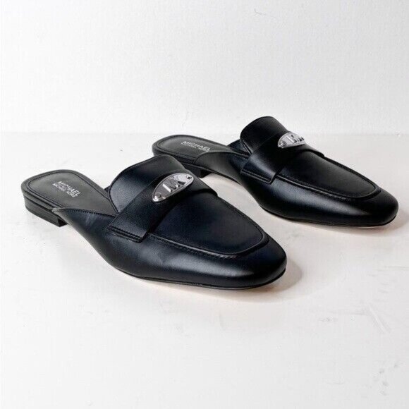 MICHAEL Michael Kors Shoes - MICHAEL Michael Kors BNWT "Ashley" black logo plate mules women NEW
